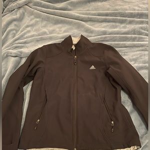 Black Adidas outdoor jacket. Weather wicking material. Thermal but lightweight